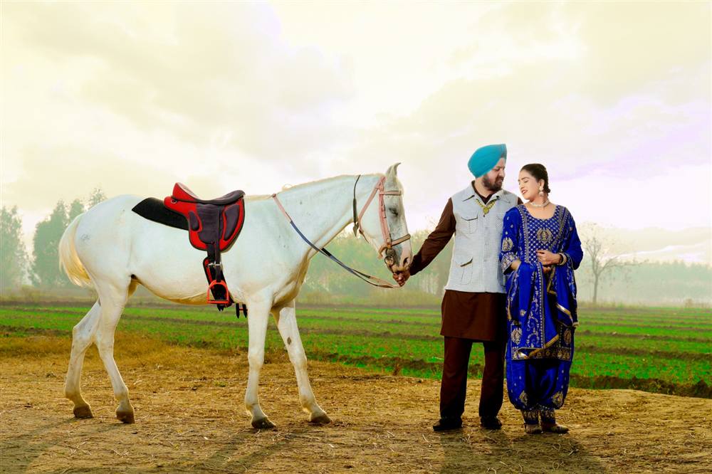 Couple with white horse in Punjab fields Rattu Studio pre-wedding